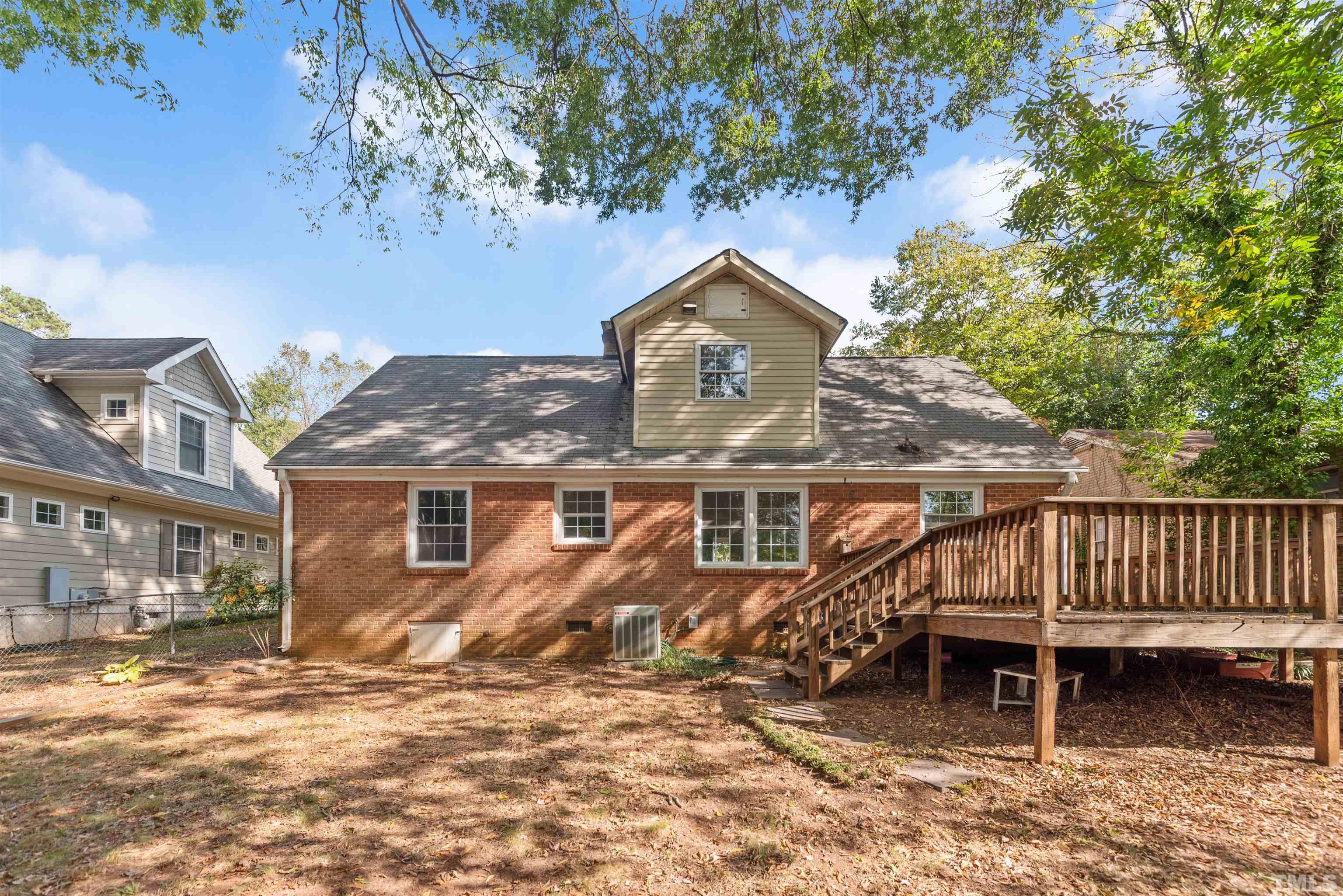 711 Latta Street Raleigh, NC 27607 - Photo 28 of 30 a front view of a house with a yard