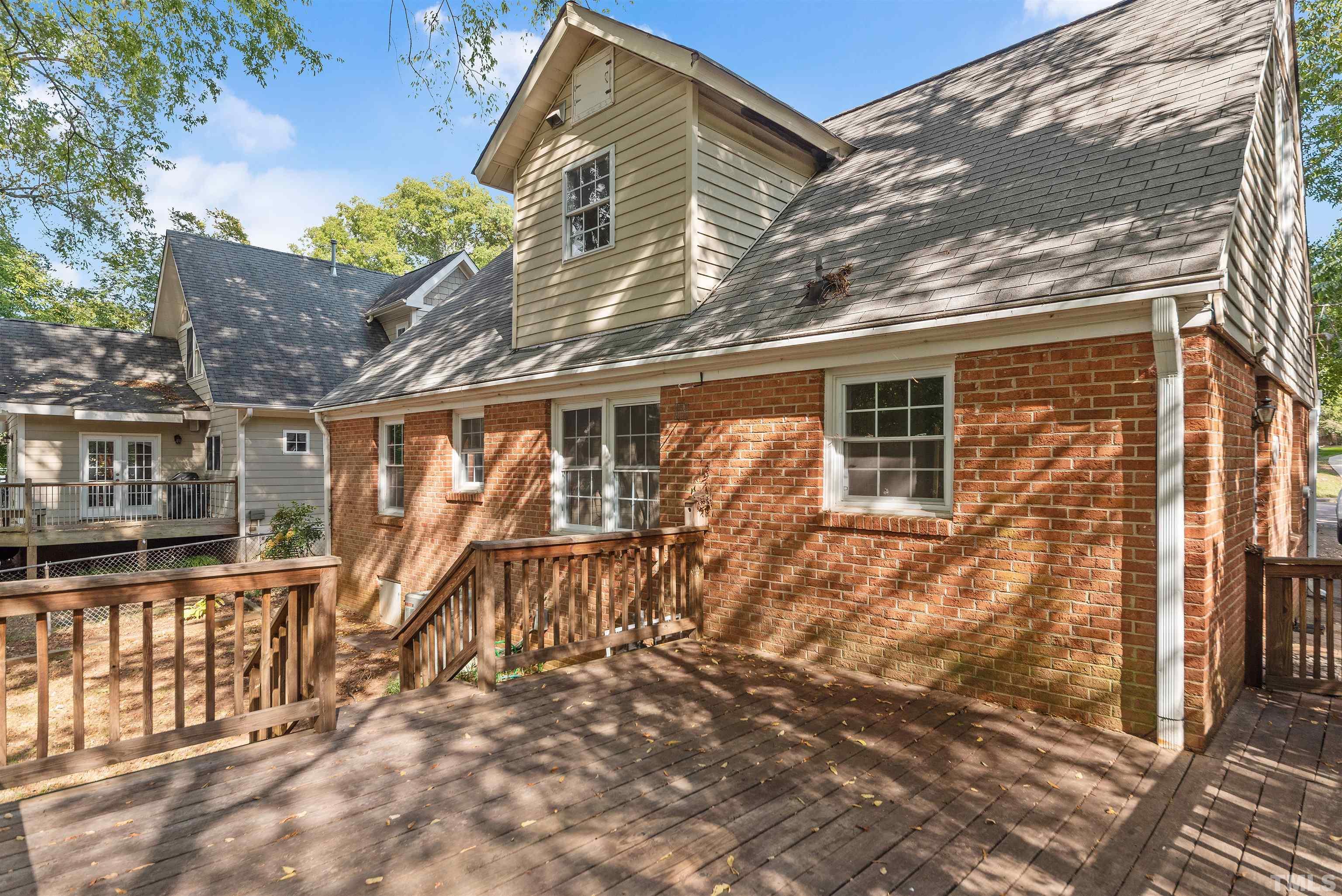 711 Latta Street Raleigh, NC 27607 - Photo 30 of 30 a view of a house with a yard