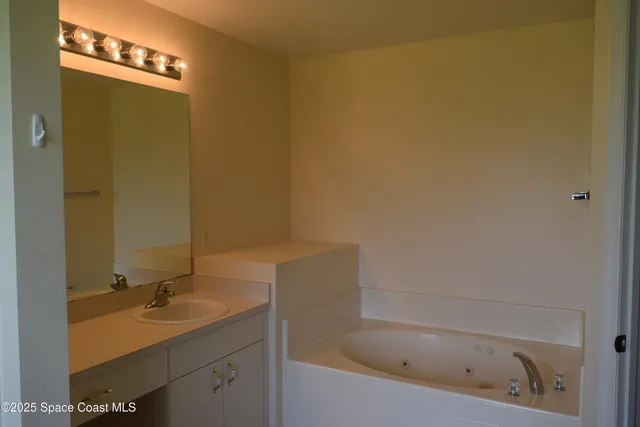 a bathroom with a sink and a bathtub