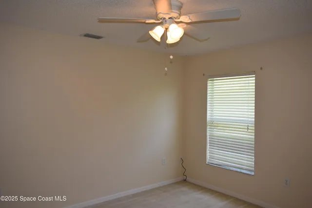 en empty room with a window