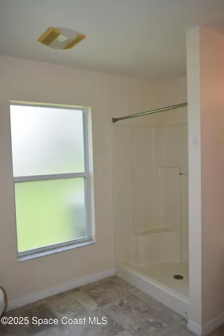 a bathroom with a window