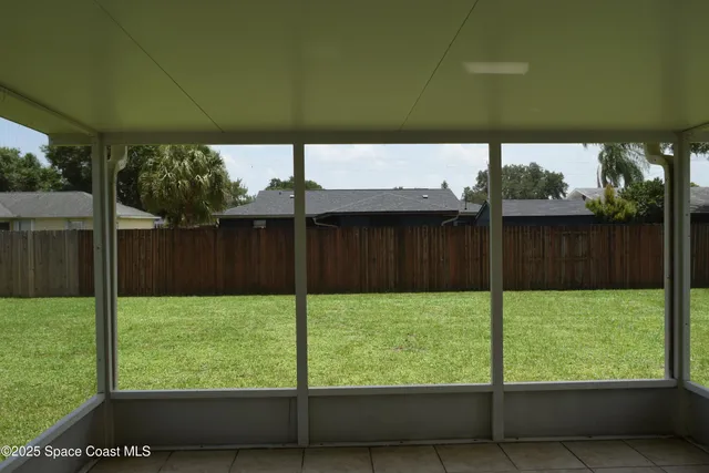 a view of a backyard with a garden