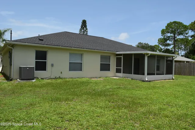 a house that has garden in front of it