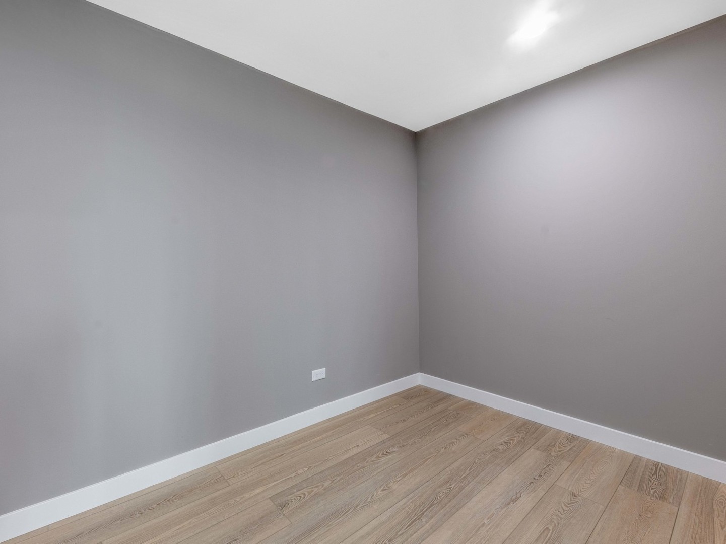 3548 Clinton Avenue Berwyn, IL 60402 - Photo 18 of 49 a view of an empty room with wooden floor