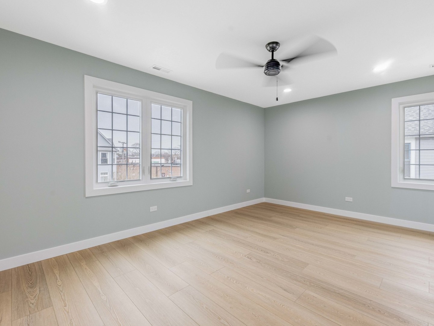 3548 Clinton Avenue Berwyn, IL 60402 - Photo 22 of 49 wooden floor in an empty room with a window