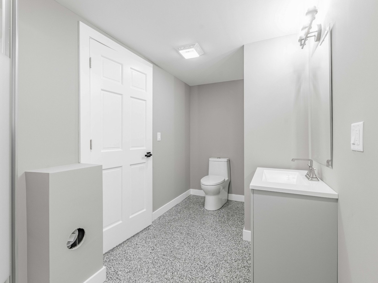 3548 Clinton Avenue Berwyn, IL 60402 - Photo 39 of 49 a bathroom with a toilet sink and mirror