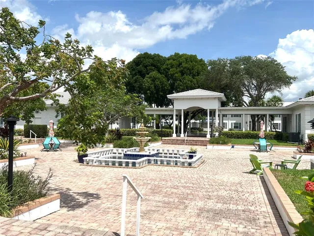 a view of swimming pool with a patio