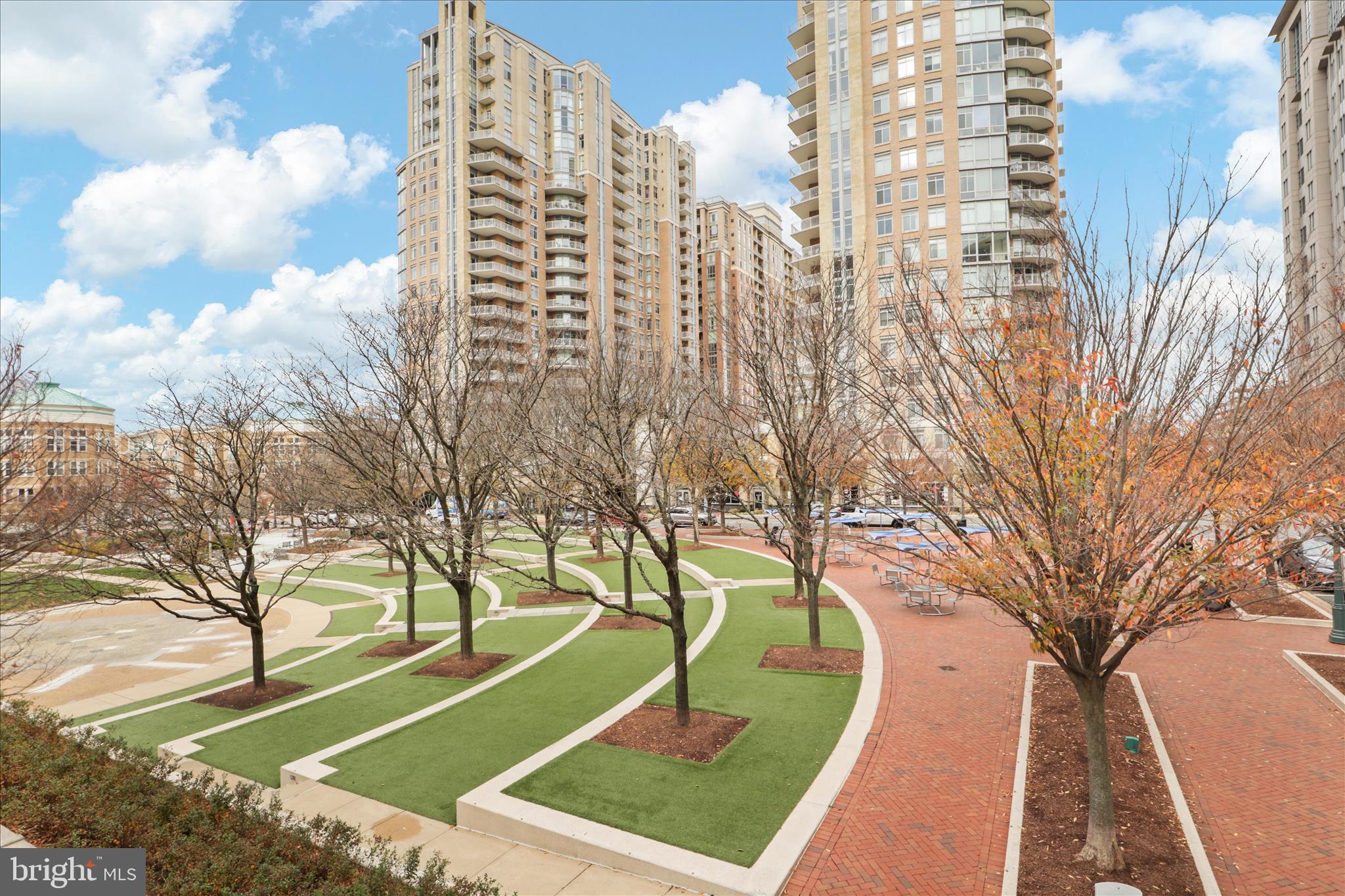 11990 Market Street, Unit 216 Reston, VA 20190 - Photo 3 of 41 a view of a city with tall buildings