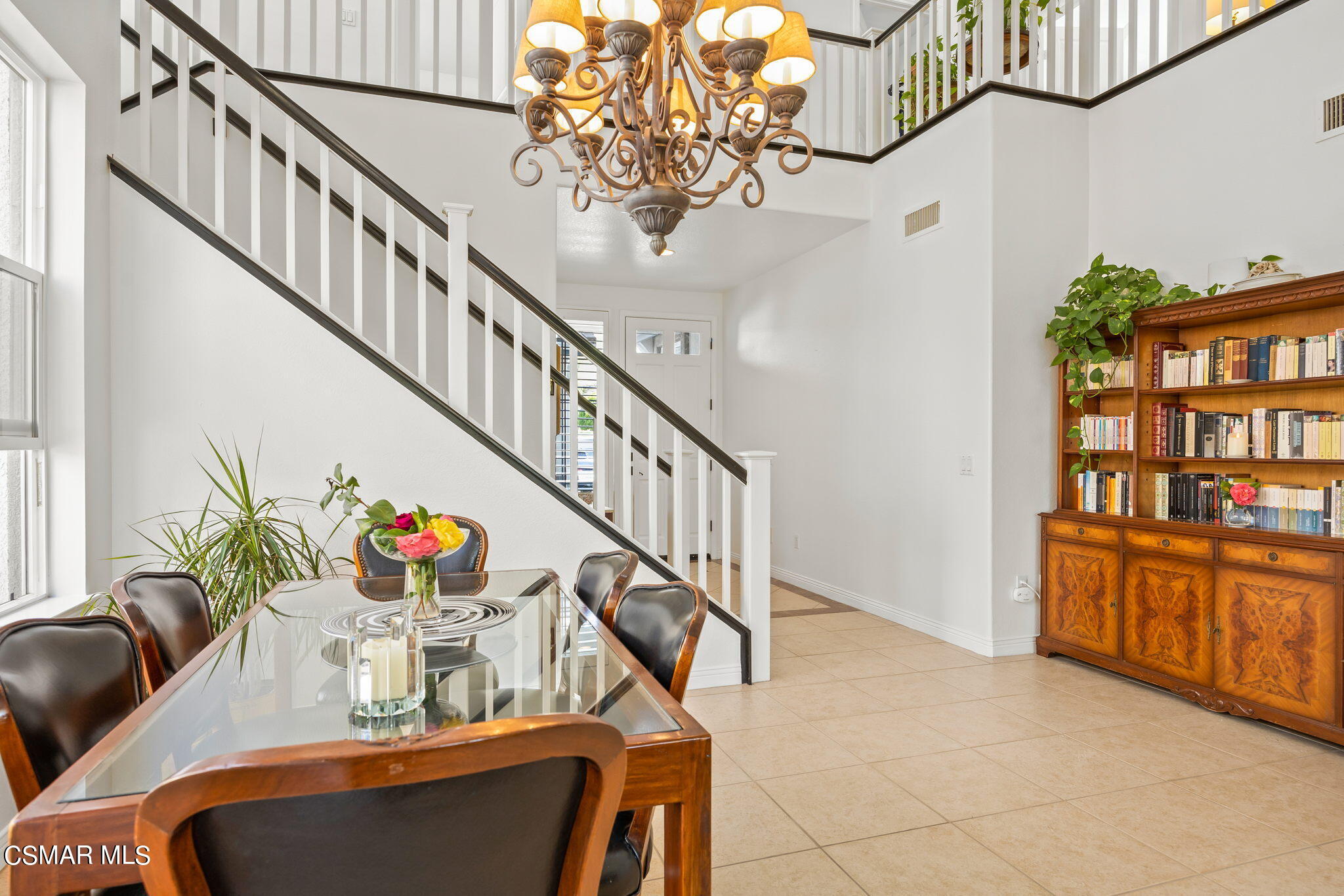 388 Woodland Road Simi Valley, CA 93065 - Photo 11 of 62 a dining room with furniture entryway and wooden floor