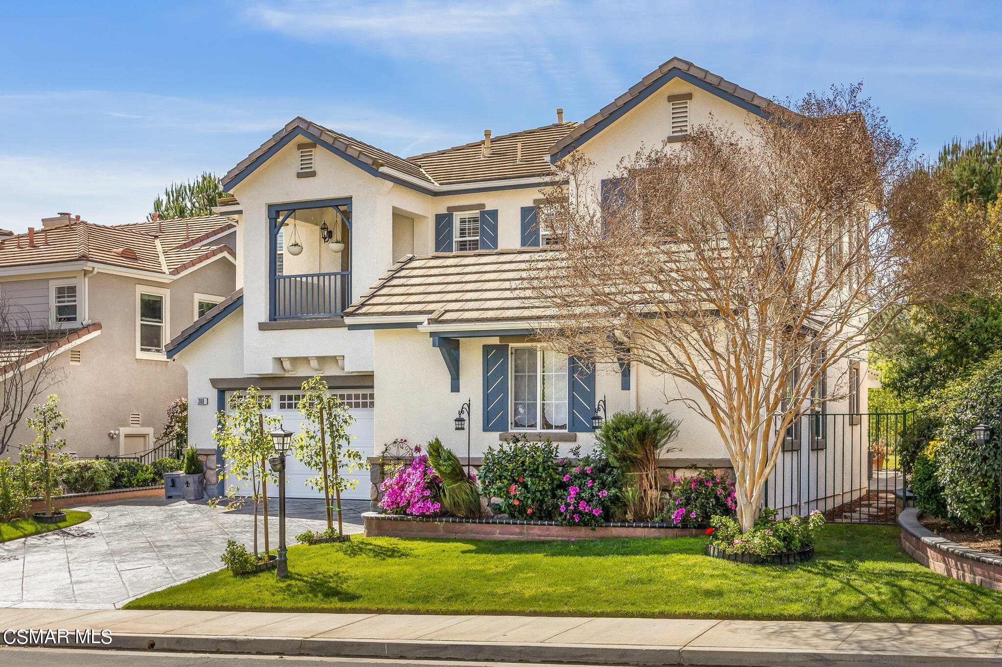 388 Woodland Road Simi Valley, CA 93065 - Photo 2 of 62 a front view of a house with a yard