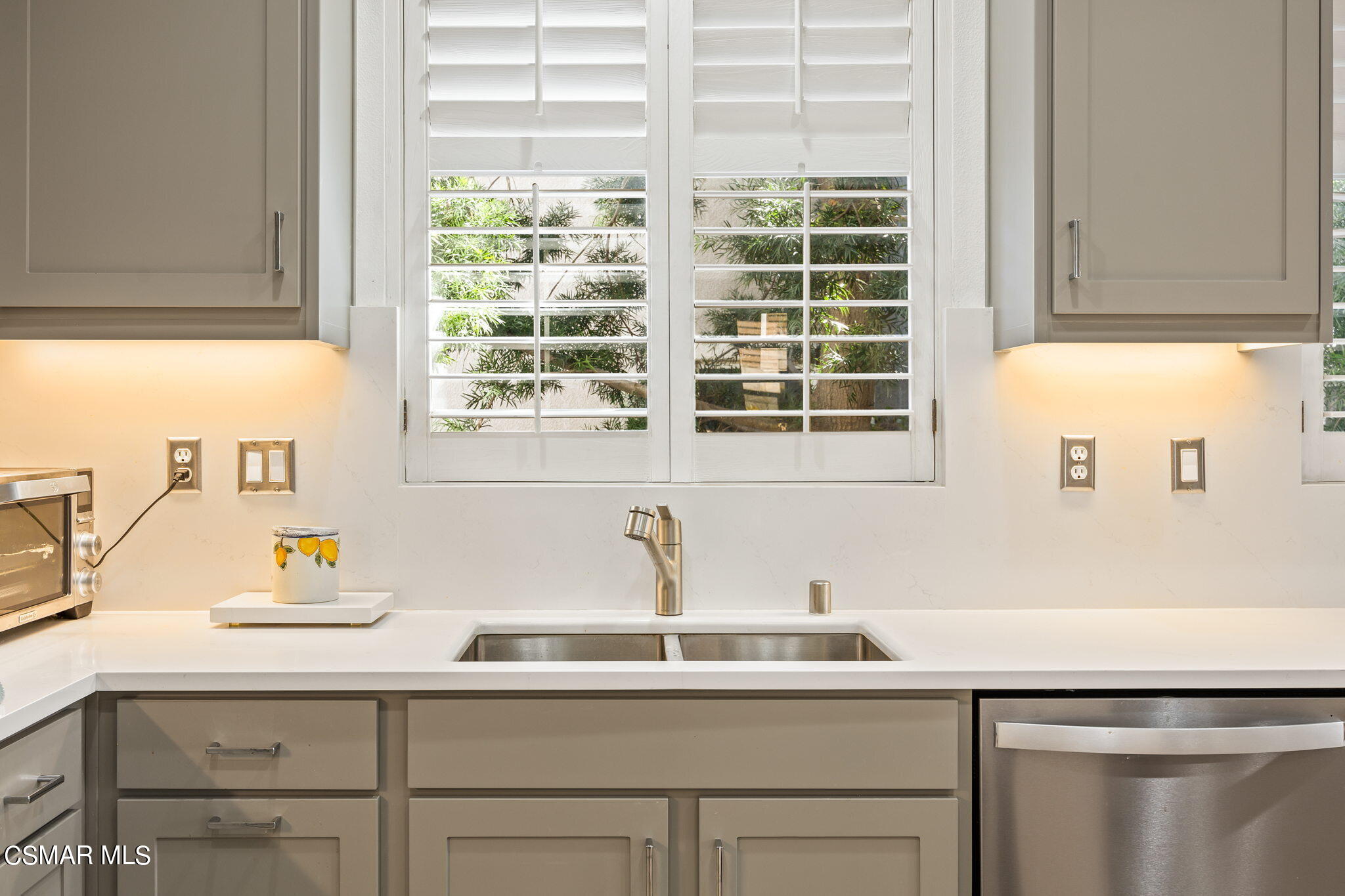 388 Woodland Road Simi Valley, CA 93065 - Photo 21 of 62 a kitchen with a sink and a window