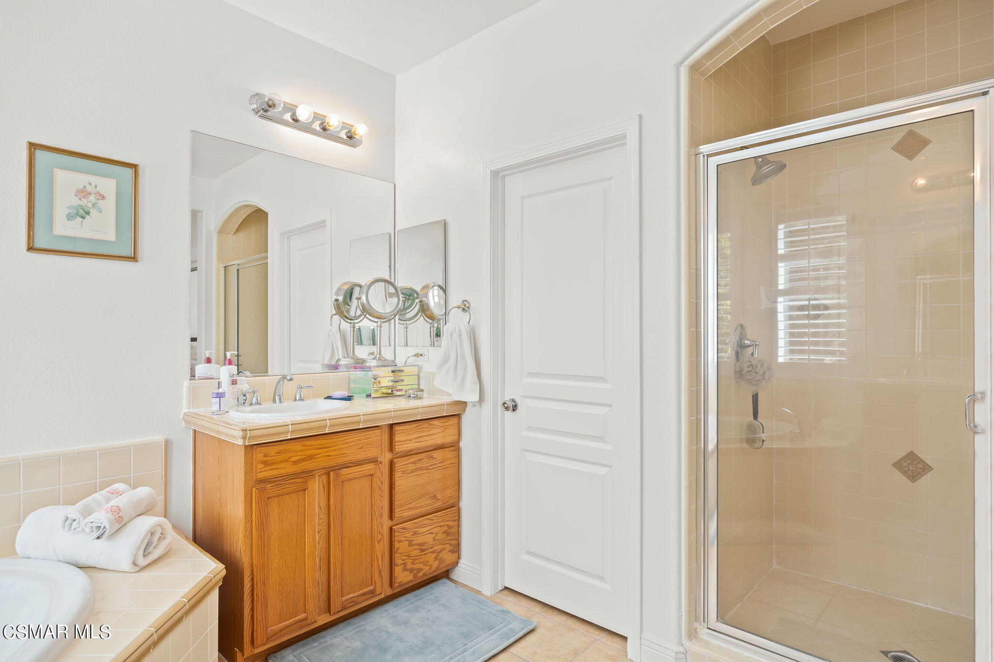 388 Woodland Road Simi Valley, CA 93065 - Photo 29 of 62 a bathroom with a granite countertop sink a toilet and shower
