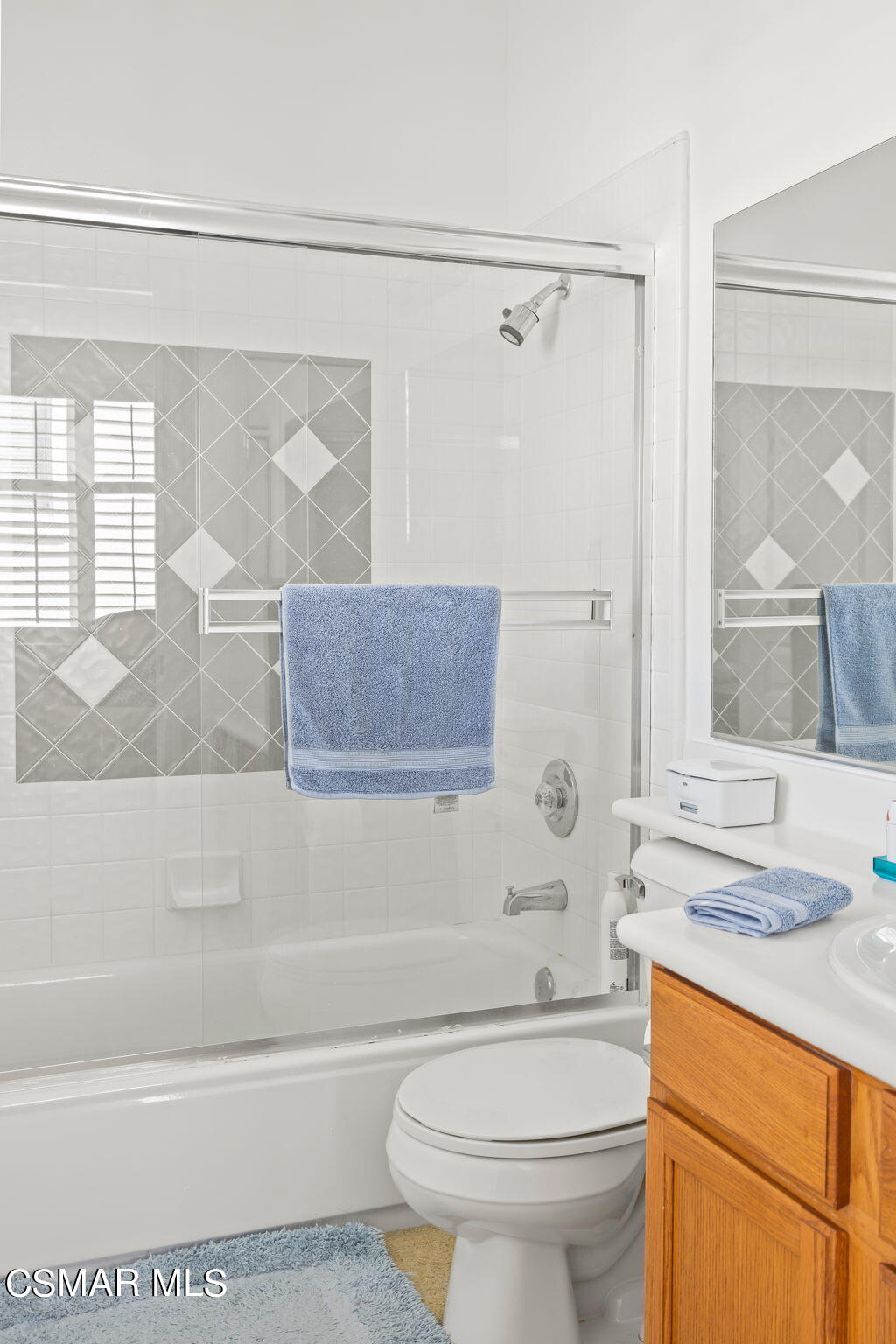 388 Woodland Road Simi Valley, CA 93065 - Photo 44 of 62 a bathroom with a granite countertop toilet sink and bathtub