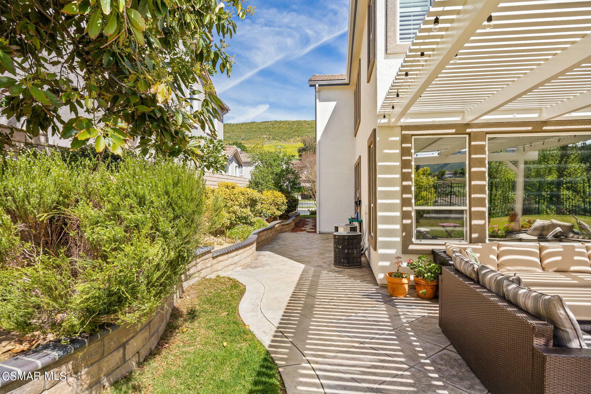 388 Woodland Road Simi Valley, CA 93065 - Photo 54 of 62 a balcony with couch and wooden floor