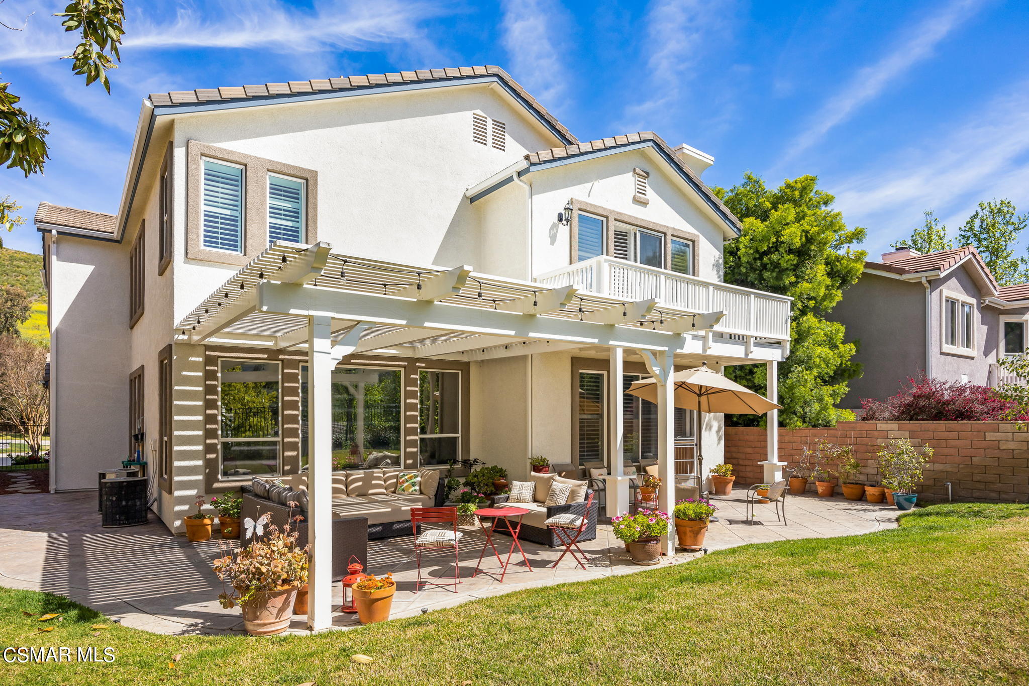 388 Woodland Road Simi Valley, CA 93065 - Photo 56 of 62 a view of a house with backyard porch and sitting area