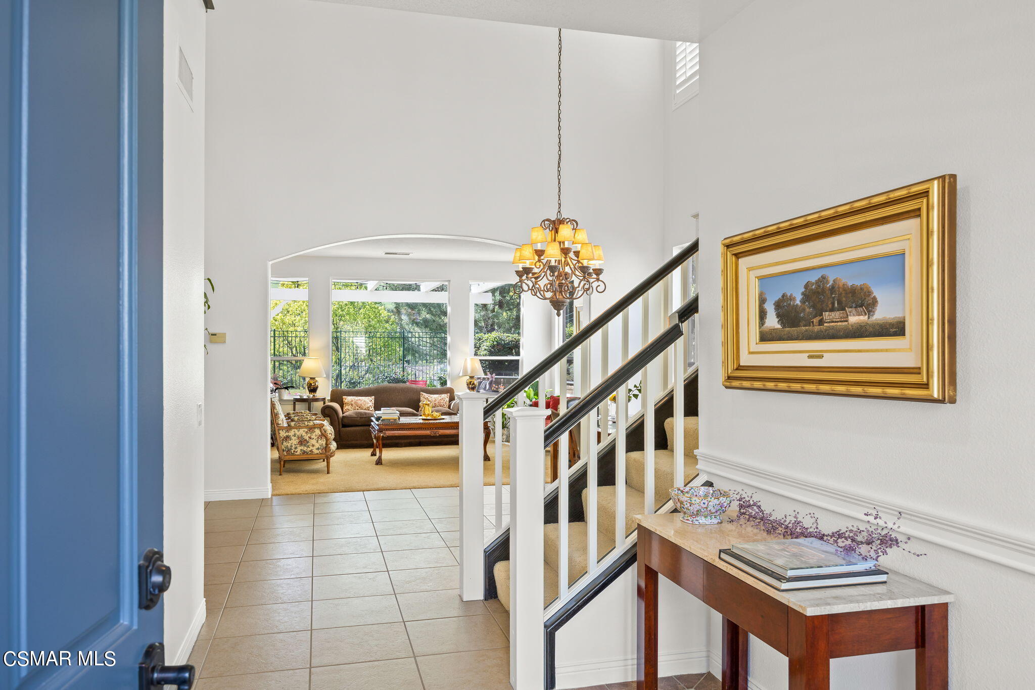 388 Woodland Road Simi Valley, CA 93065 - Photo 6 of 62 a view of an entryway and livingroom with furniture