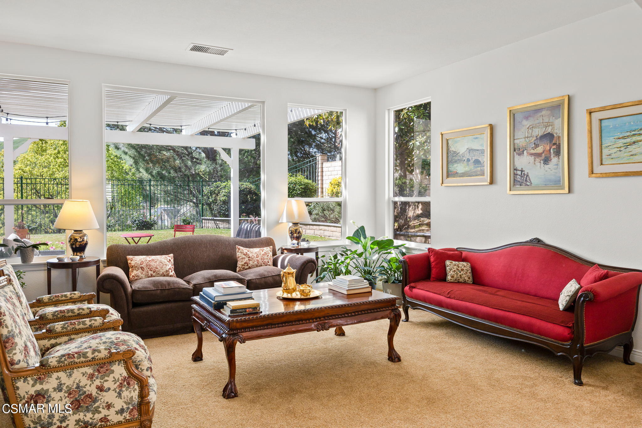 388 Woodland Road Simi Valley, CA 93065 - Photo 8 of 62 a living room with furniture and a potted plant