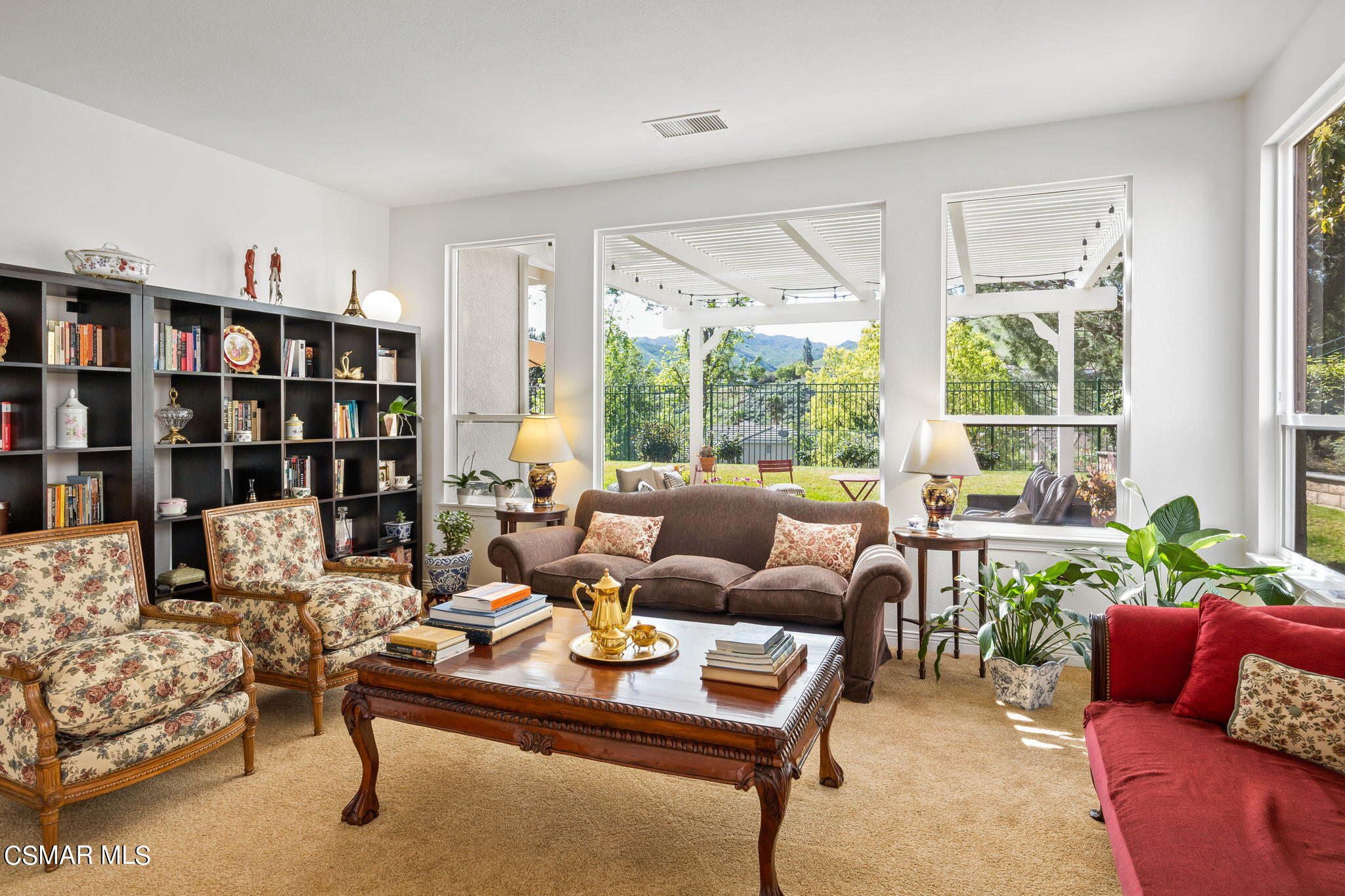 388 Woodland Road Simi Valley, CA 93065 - Photo 9 of 62 a living room with furniture large window and wooden floor