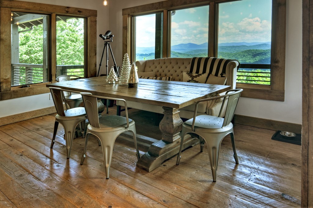 440 Cochise Road Cherry Log, GA 30522 - Photo 8 of 82 a view of a dining room with furniture window and wooden floor