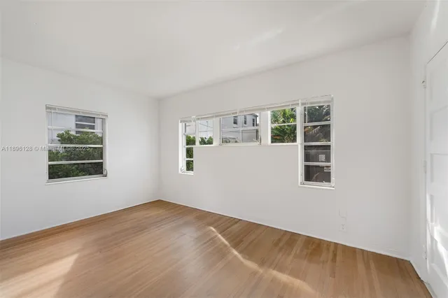 a view of empty room with windows