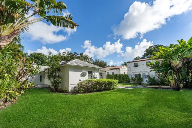 a view of a house with a garden