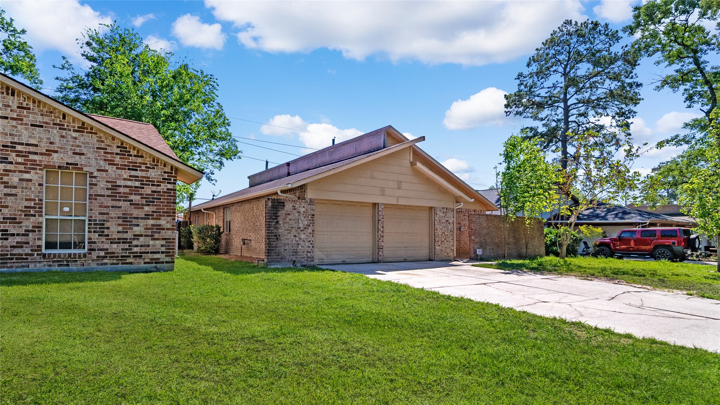 23414 Canyon Lake Drive Spring, TX 77373 - Photo 13 of 21 a view of a house with a yard and pathway