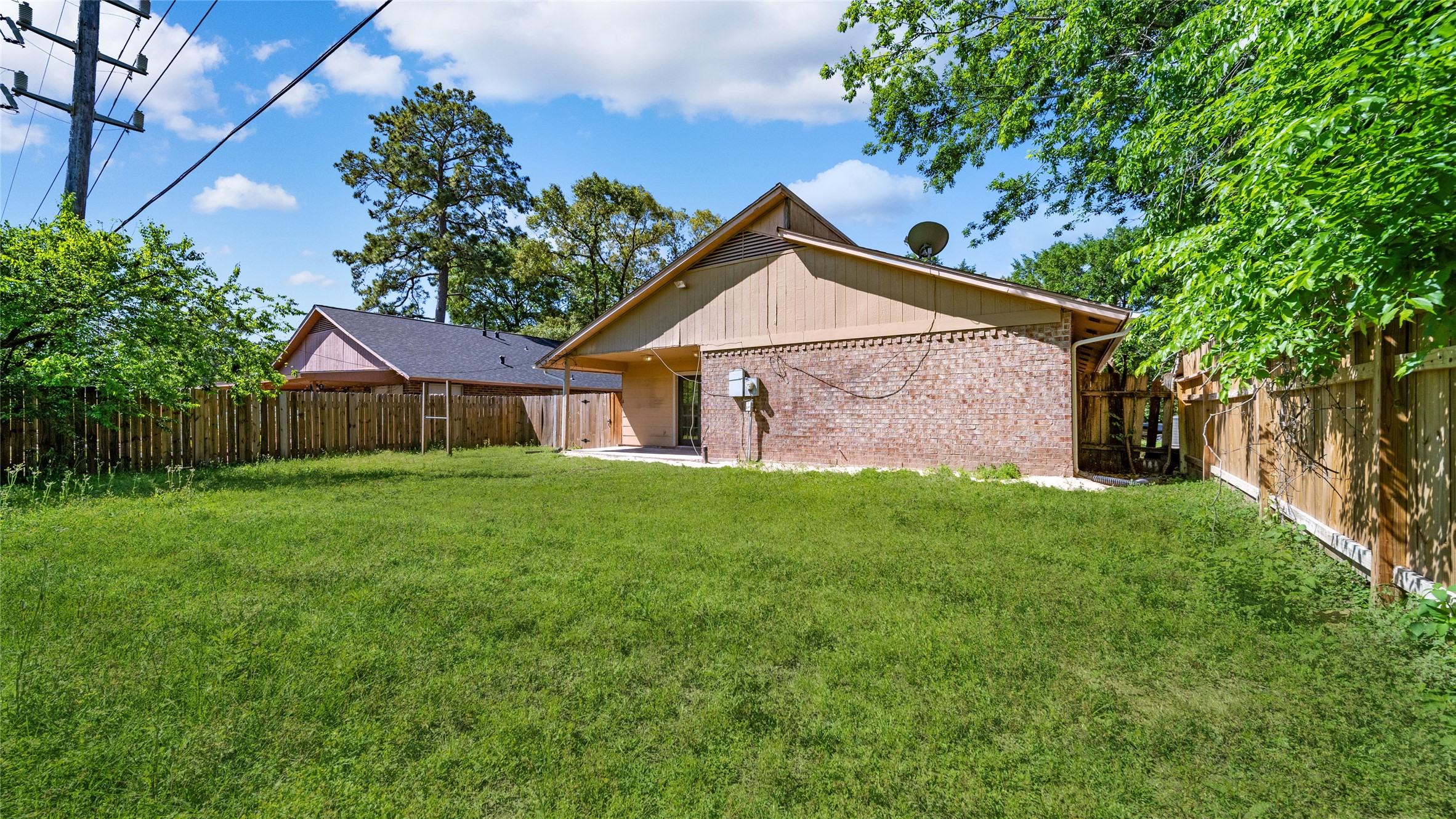23414 Canyon Lake Drive Spring, TX 77373 - Photo 14 of 21 a front view of a house with garden