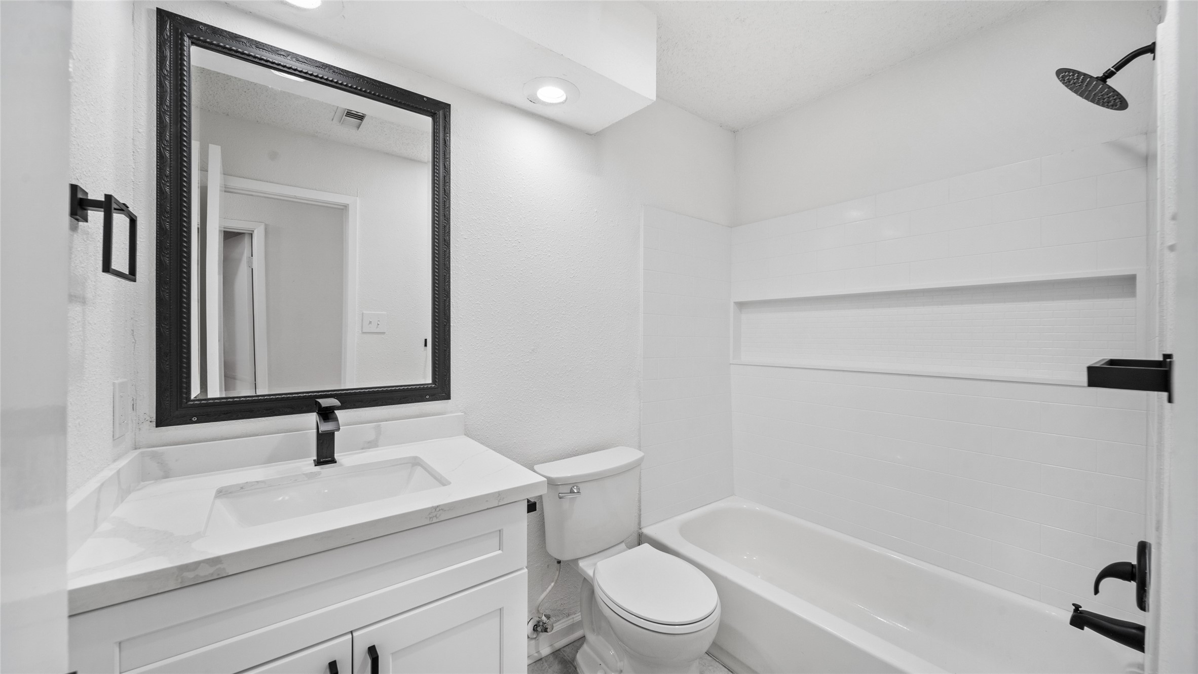 23414 Canyon Lake Drive Spring, TX 77373 - Photo 6 of 21 a bathroom with a sink toilet and shower