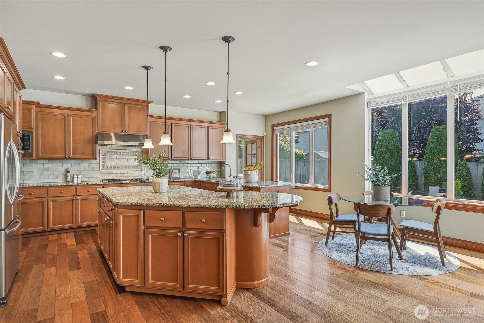 3932 221st Place Southeast Bothell, WA 98021 - Photo 15 of 36 a kitchen with lots of counter space and a sink