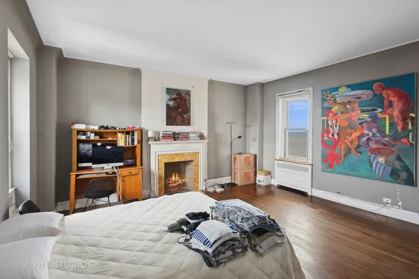 a bed room with a bed and furniture