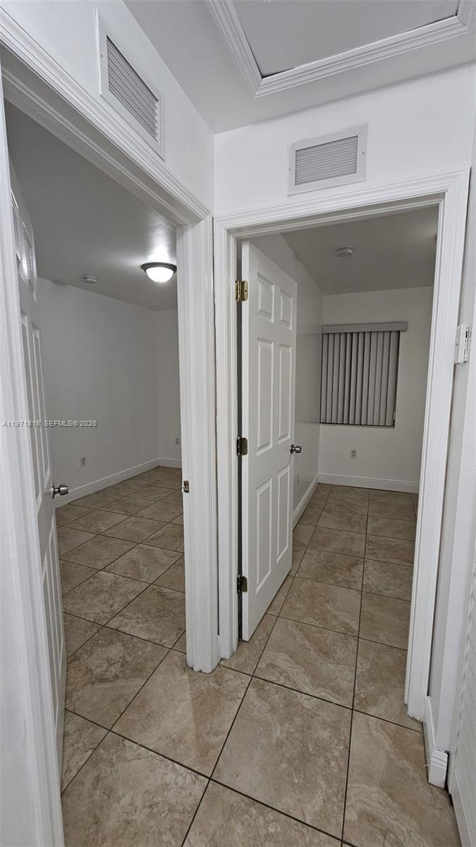 535 Northwest 19th Street, Unit 369 Miami, FL 33136 - Photo 11 of 26 a view of a hallway