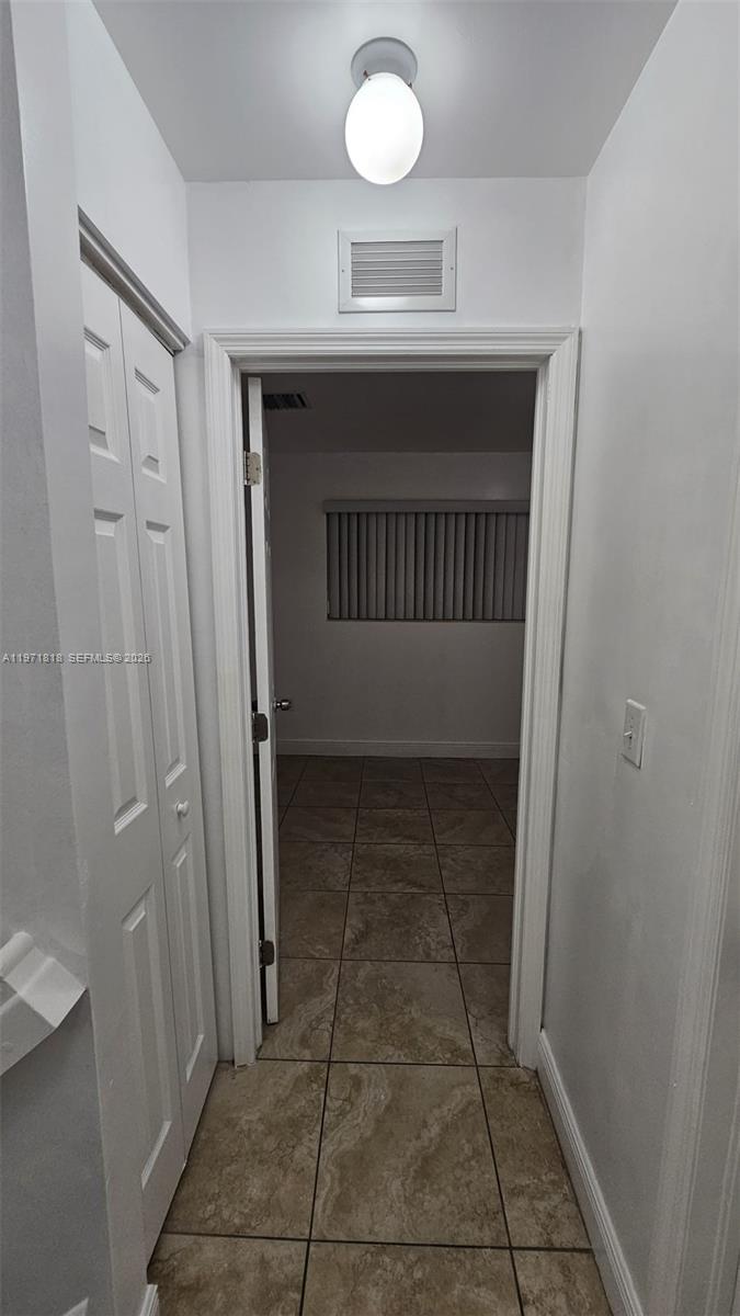 535 Northwest 19th Street, Unit 369 Miami, FL 33136 - Photo 18 of 26 a view of a hallway