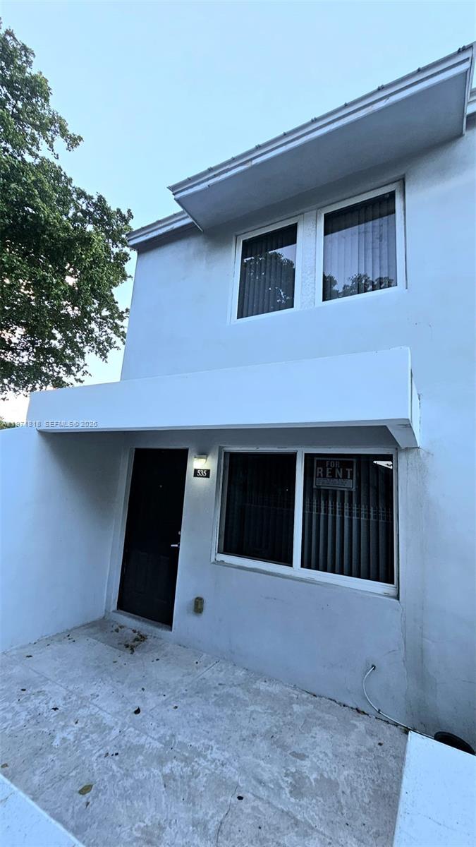 535 Northwest 19th Street, Unit 369 Miami, FL 33136 - Photo 3 of 26 a front view of a house