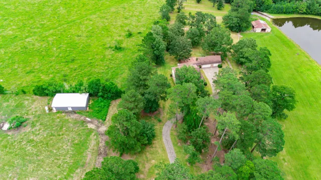 a partial view of a house with a yard