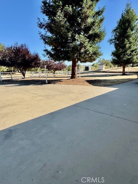 3589 Quail Ridge Drive Mariposa, CA 95338 - Photo 31 of 36 a view of outdoor space with swimming pool and trees