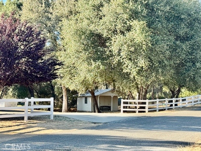 3589 Quail Ridge Drive Mariposa, CA 95338 - Photo 36 of 36 a view of a swimming pool and trees in the background