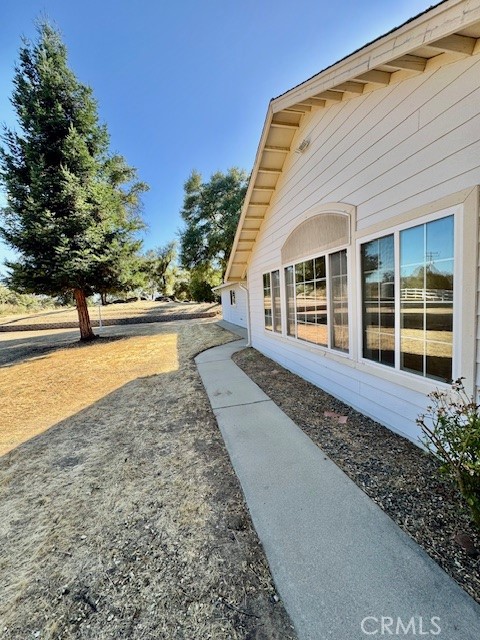 3589 Quail Ridge Drive Mariposa, CA 95338 - Photo 6 of 36 a house with trees in the background