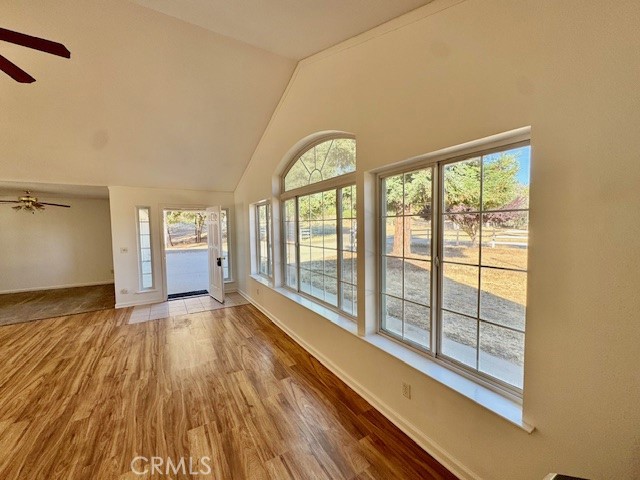 3589 Quail Ridge Drive Mariposa, CA 95338 - Photo 7 of 36 an empty room with wooden floor and windows
