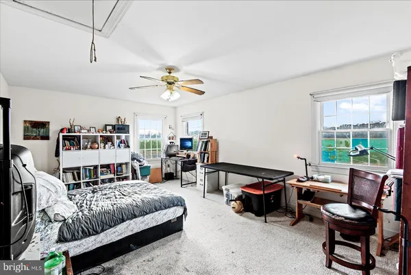 a bed room with a bed and gym equipment
