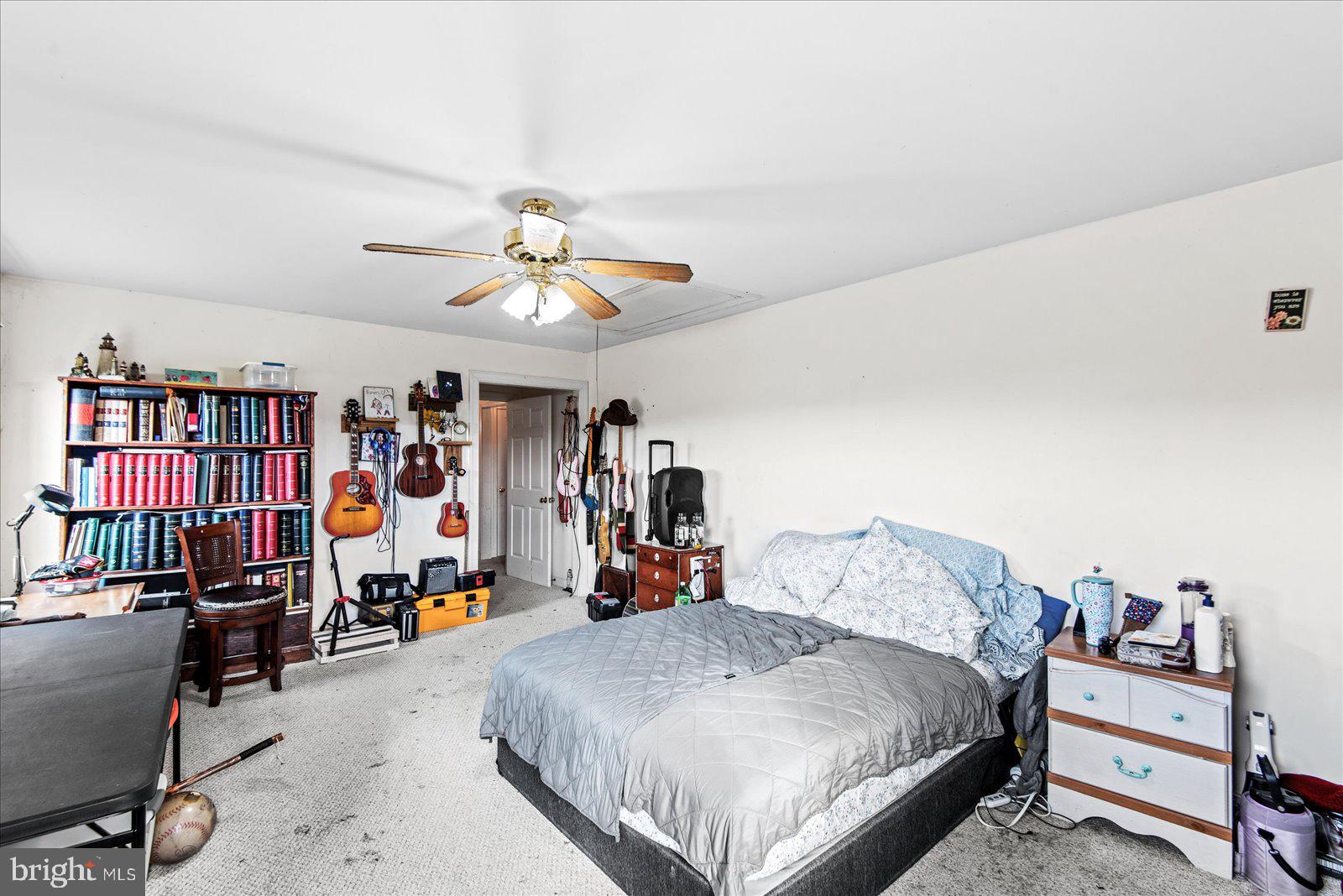 1606 Prospect Hill Road Montross, VA 22520 - Photo 21 of 32 a bed room with a bed and gym equipment