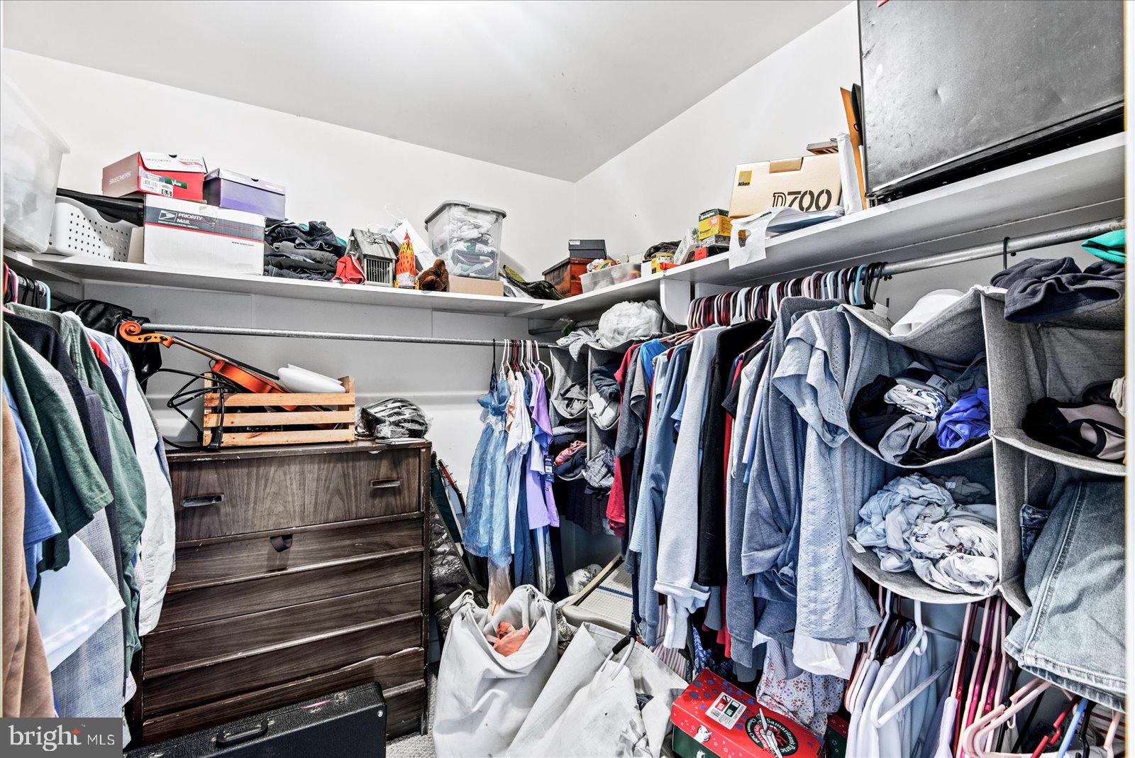 1606 Prospect Hill Road Montross, VA 22520 - Photo 22 of 32 a view of walk in closet with clothes and shoes