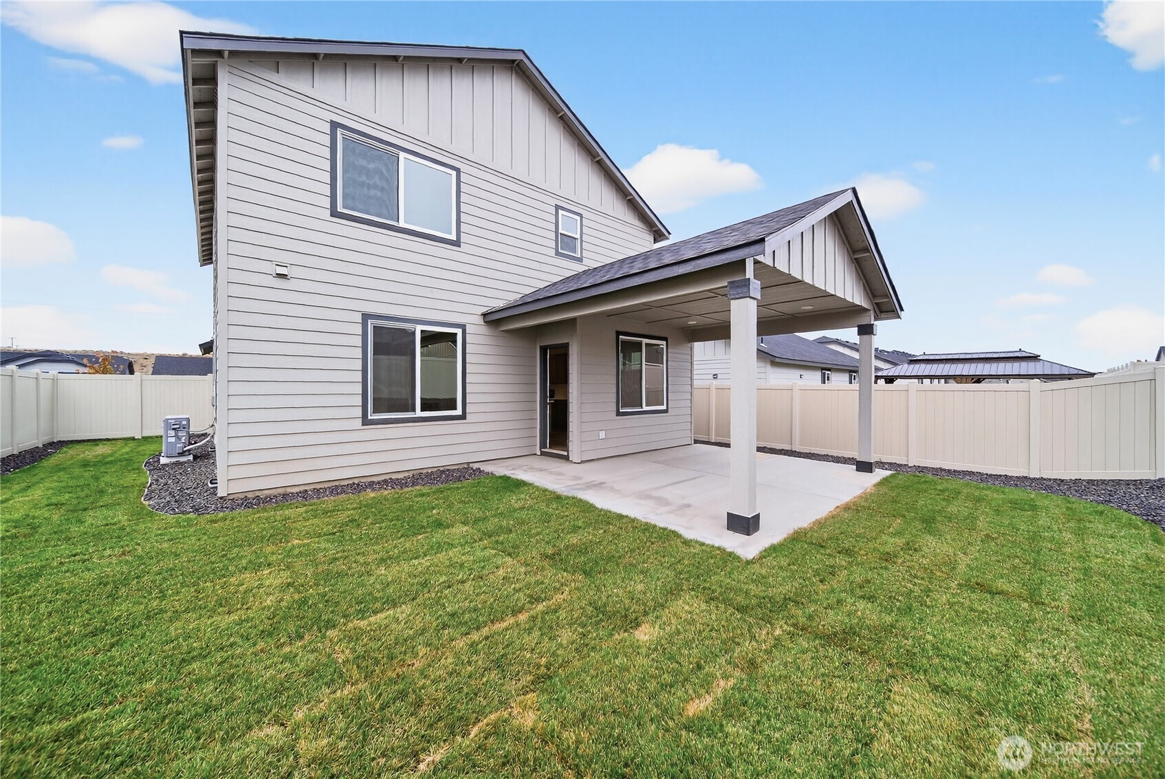 1903 Hickory Road Moses Lake, WA 98837 - Photo 5 of 12 a view of a house with backyard and garden