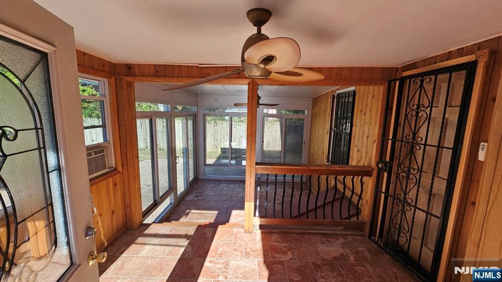 1167 Bergen Street Newark, NJ 07112 - Photo 20 of 23 a view of a hallway with wooden floor and staircase