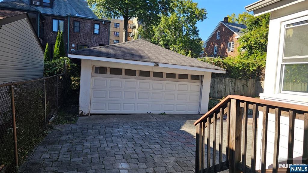 1167 Bergen Street Newark, NJ 07112 - Photo 21 of 23 a view of a house with a yard