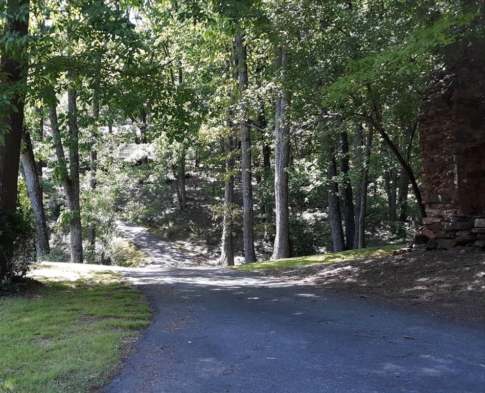 4880 Wigley Road Marietta, GA 30066 - Photo 1 of 1 4880 Wigley Road- Believe me there is a house tucked back up in trees.
