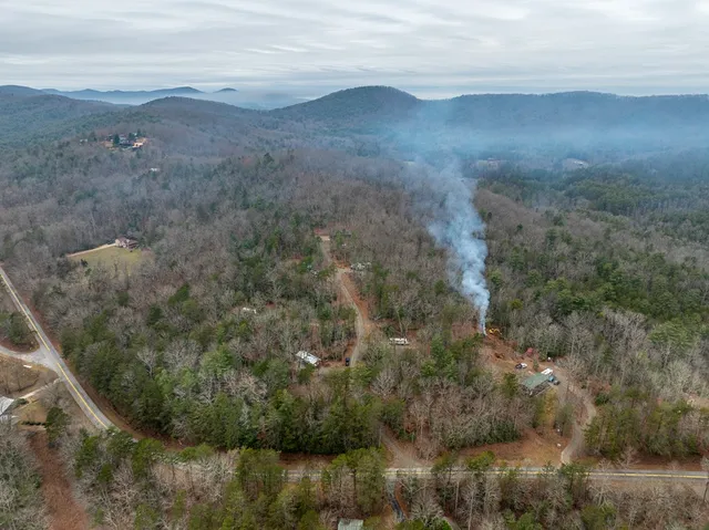 a view of a yard next to a yard