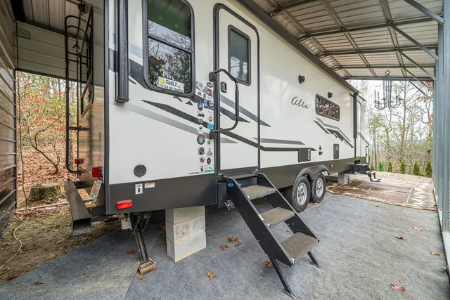 a view of a porch with furniture and a window