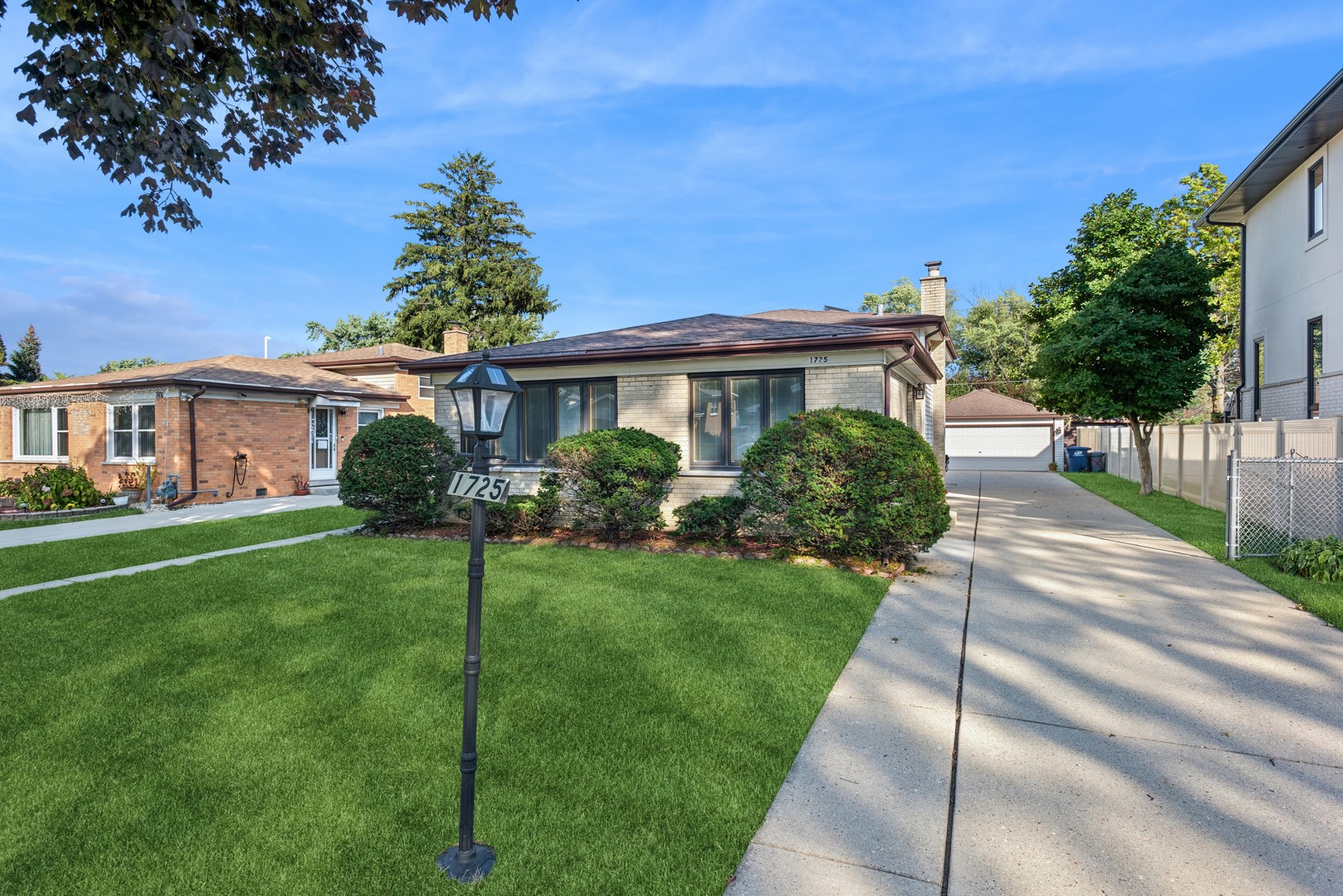 1725 Sycamore Street Des Plaines, IL 60018 - Photo 1 of 21 a view of a front of house with a yard