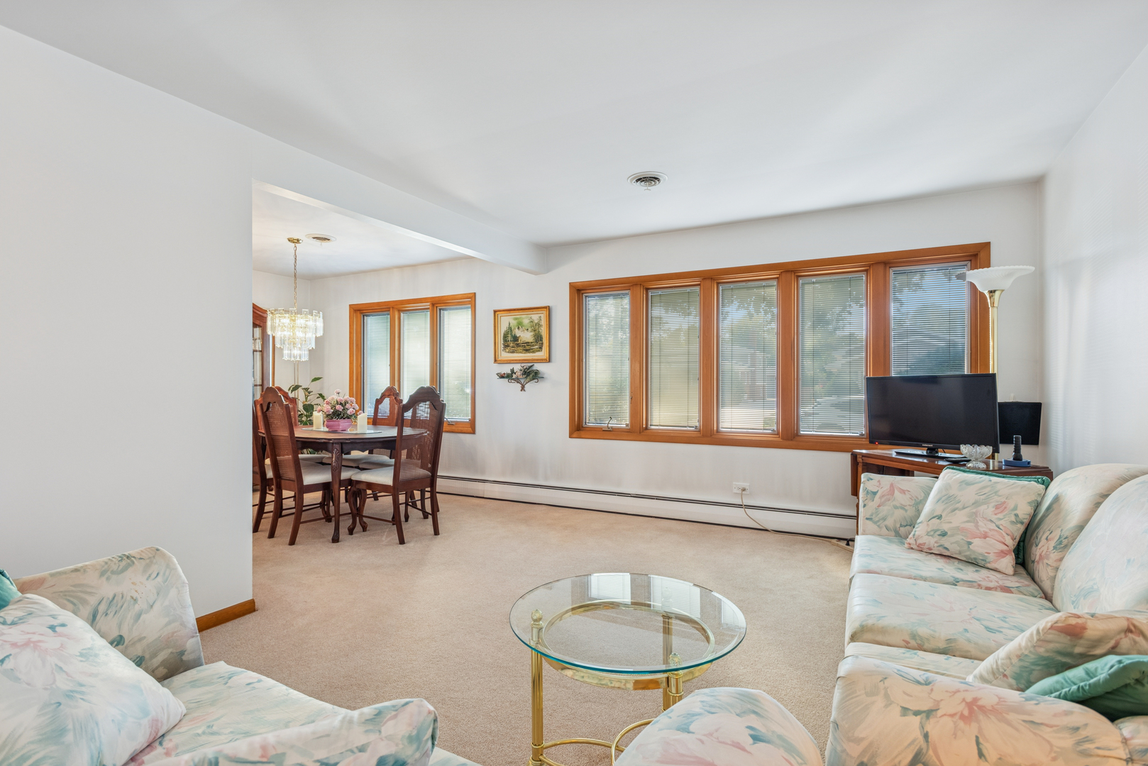 1725 Sycamore Street Des Plaines, IL 60018 - Photo 12 of 21 a living room with furniture and a large window