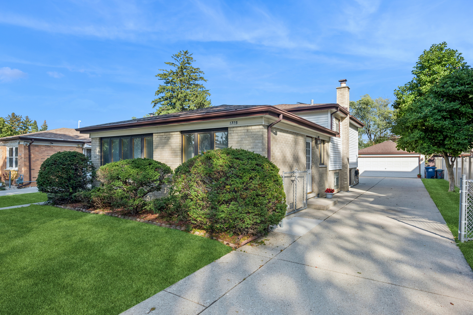 1725 Sycamore Street Des Plaines, IL 60018 - Photo 20 of 21 a view of a house with a yard